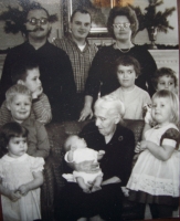 GGandFamily Harriet's Grandchildren and Greatgrandchildren: Wendy, Neal, Ross, Peter, George II, Betsy, Debbie, Diana. Harriet is holding David. Circa 1962.