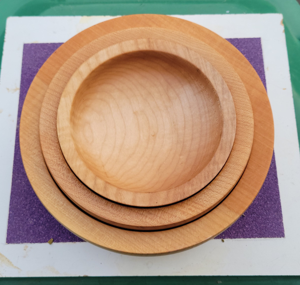 3 nested Maple bowls